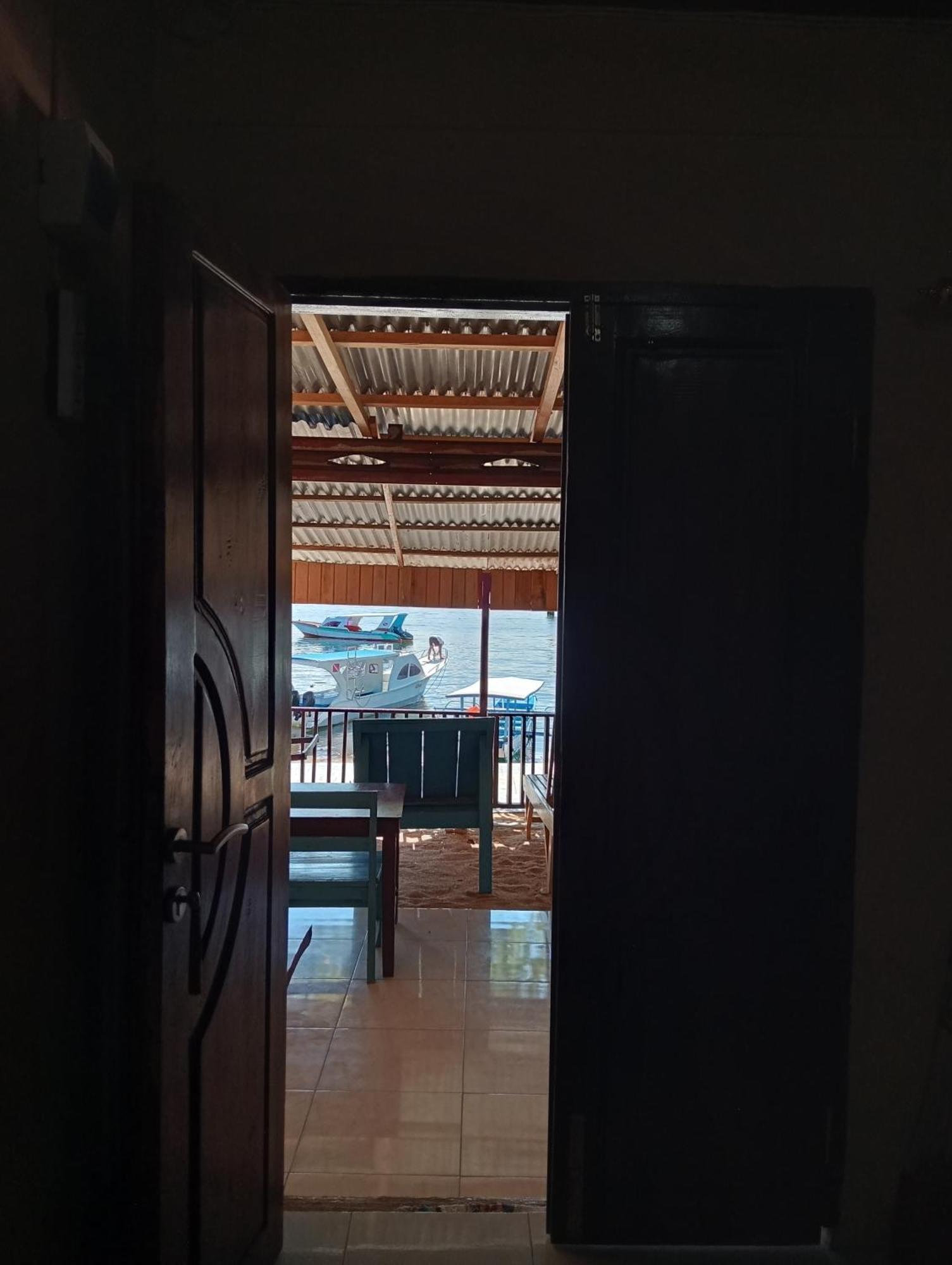 Mamalis Homestay Manado Bagian luar foto