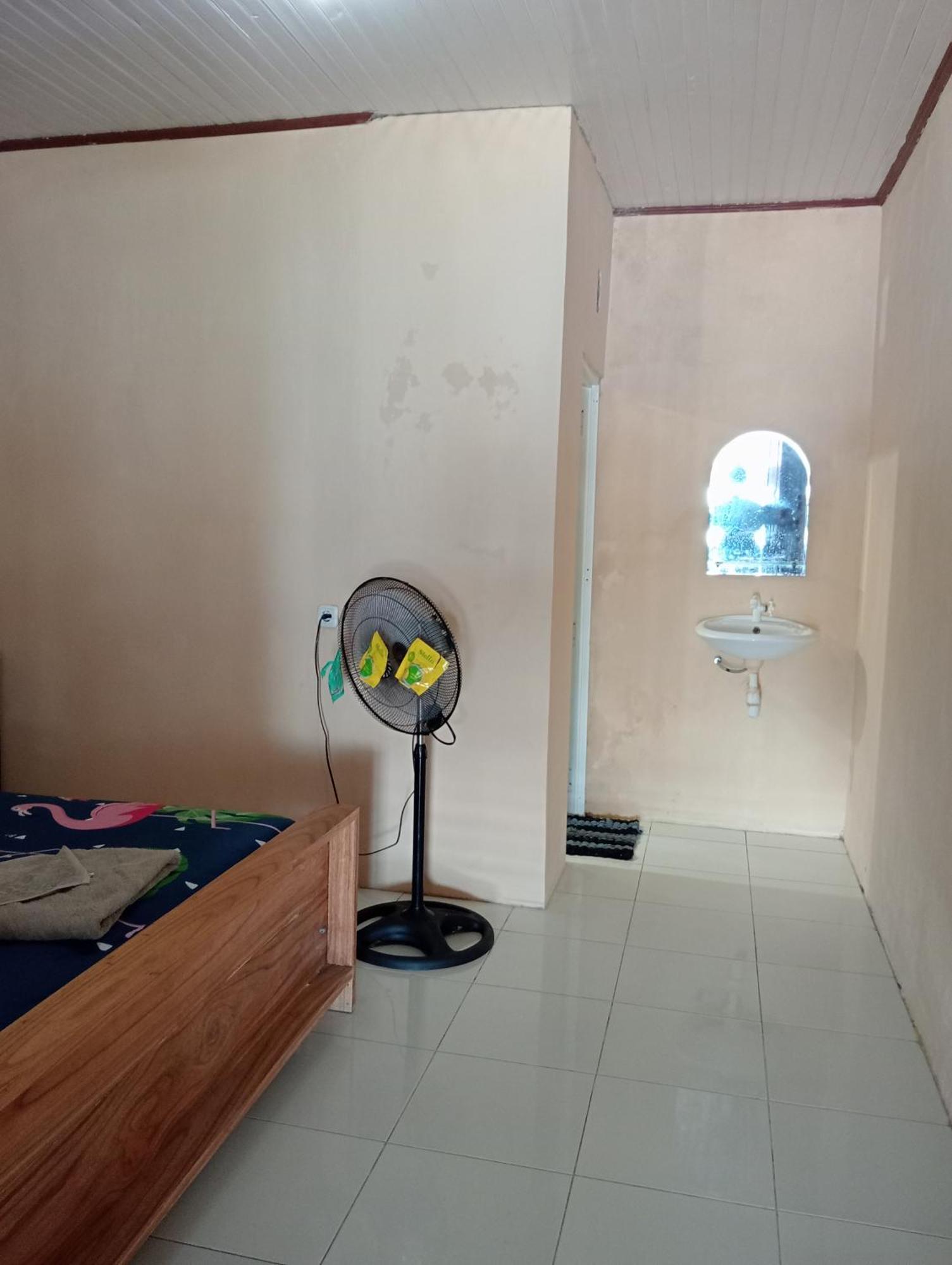 Mamalis Homestay Manado Bagian luar foto
